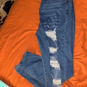 Women's Distressed Blue Jeans